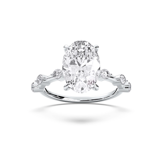 OVAL SIDE STONES RING