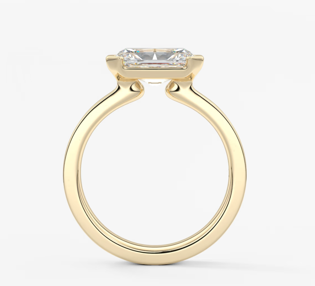 EMERALD EAST WEST RING