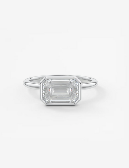 EMERALD EAST WEST WITH BEZEL RING