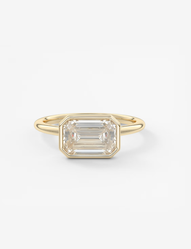 EMERALD EAST WEST WITH BEZEL RING
