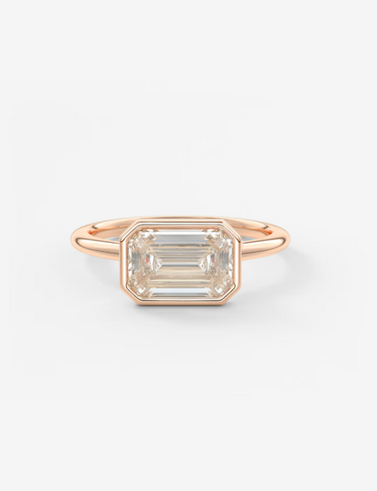 EMERALD EAST WEST WITH BEZEL RING