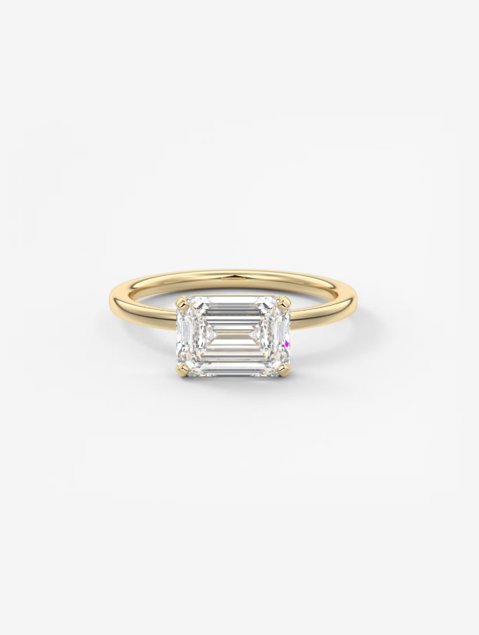 EMERALD EAST WEST RING