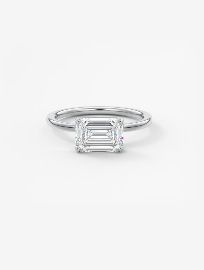 EMERALD EAST WEST RING