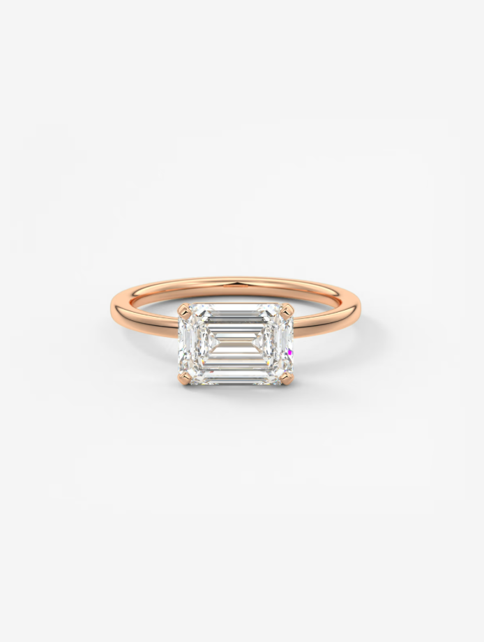 EMERALD EAST WEST RING