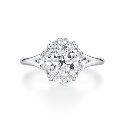 OVAL RING WITH HALF MOON SIDE STONES
