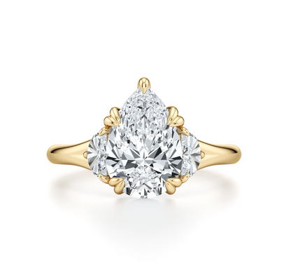 PEAR RING WITH HALF MOON SIDE STONES