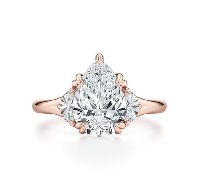PEAR RING WITH HALF MOON SIDE STONES