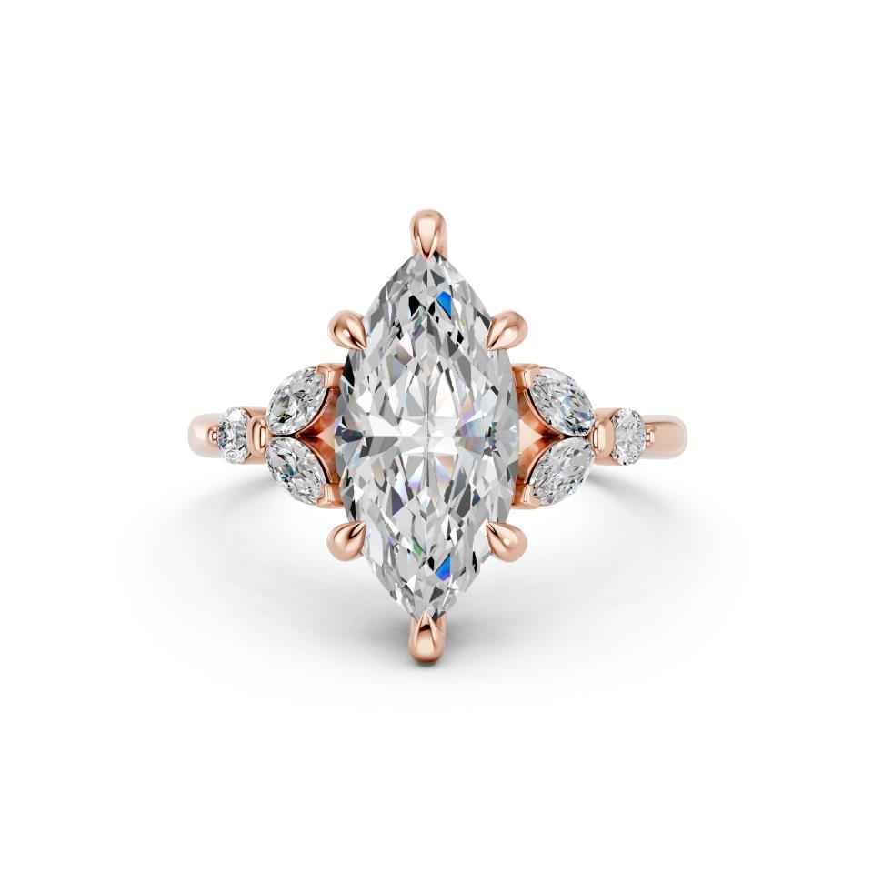MARQUISE RING WITH SIDE STONES