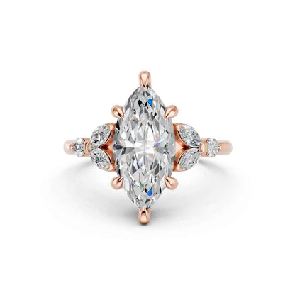 MARQUISE RING WITH SIDE STONES