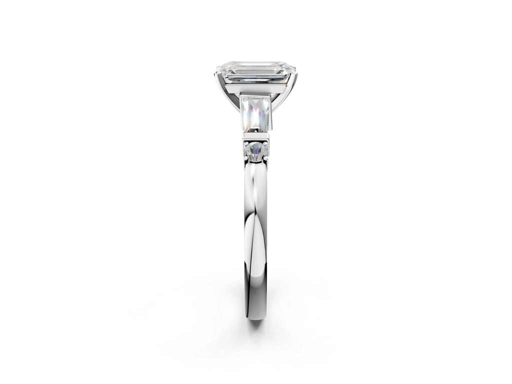 EMERALAD BAGUETTE ROUND CHANNEL RING