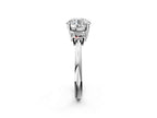ROUND TRAPAZOID 3 STONE RING