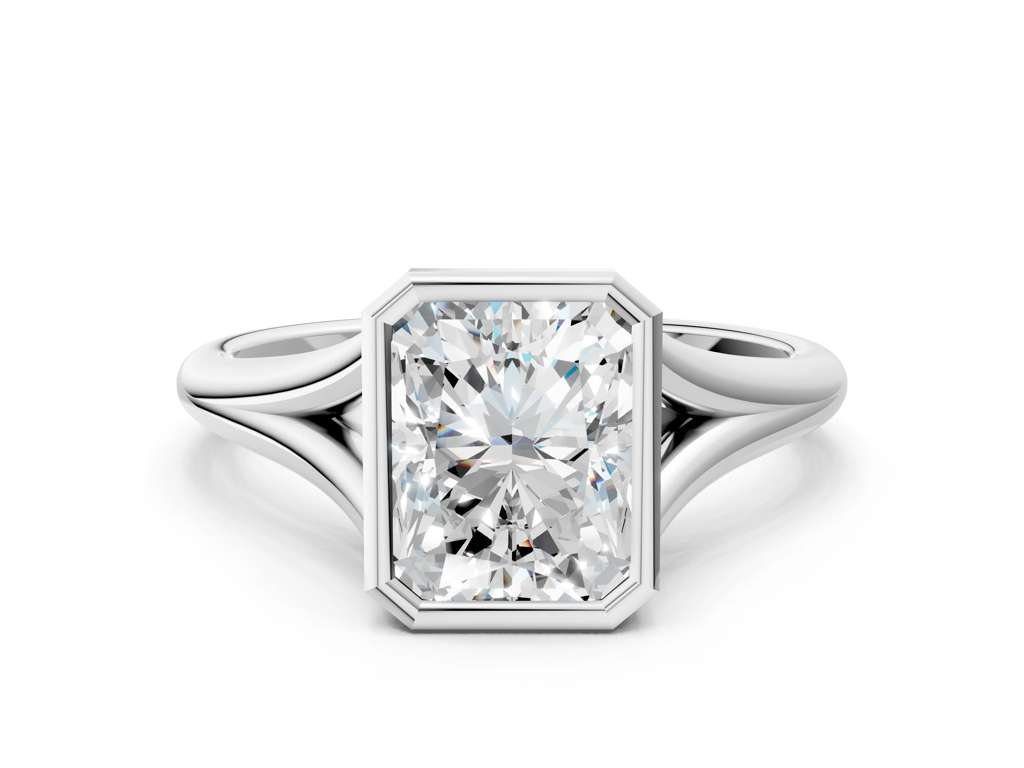 RADIANT ACCENTED BEZEL RING