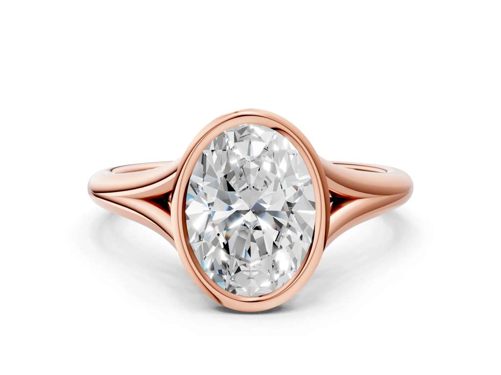 Oval Cut Bezel Set Lab Grown Diamond Engagement Ring with Split Shank| D VS1