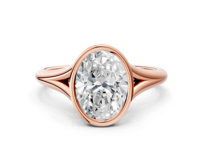 Oval Cut Bezel Set Lab Grown Diamond Engagement Ring with Split Shank| D VS1