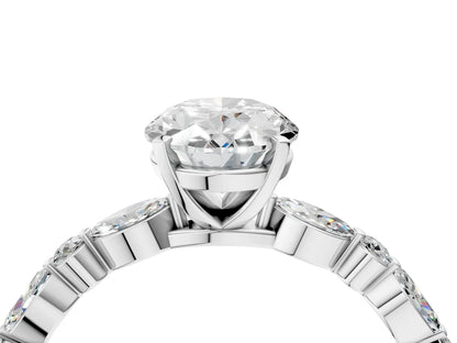 Oval Cut Diamond Ring with Marquise and Round Side Stones and Four-Prong Setting| D VS1