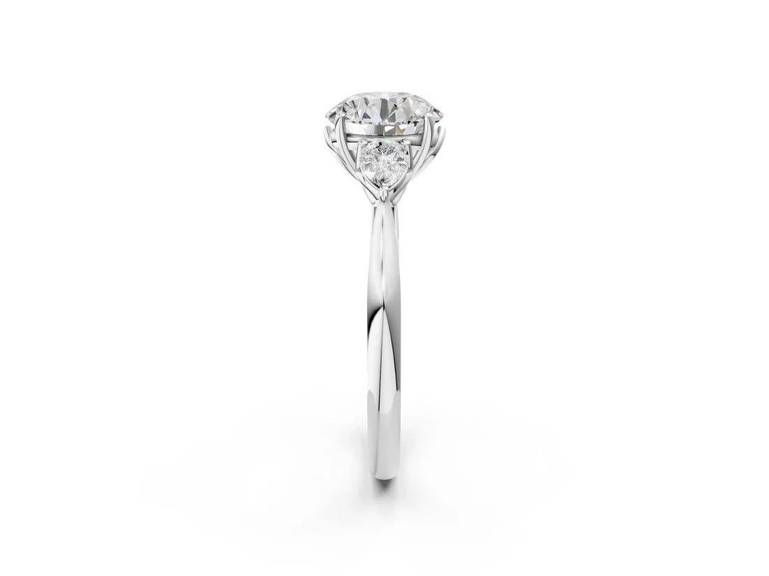 Three-Stone Round Cut Lab Diamond Solitaire Ring with Tapered Band and Four-Prong Setting| D VS1