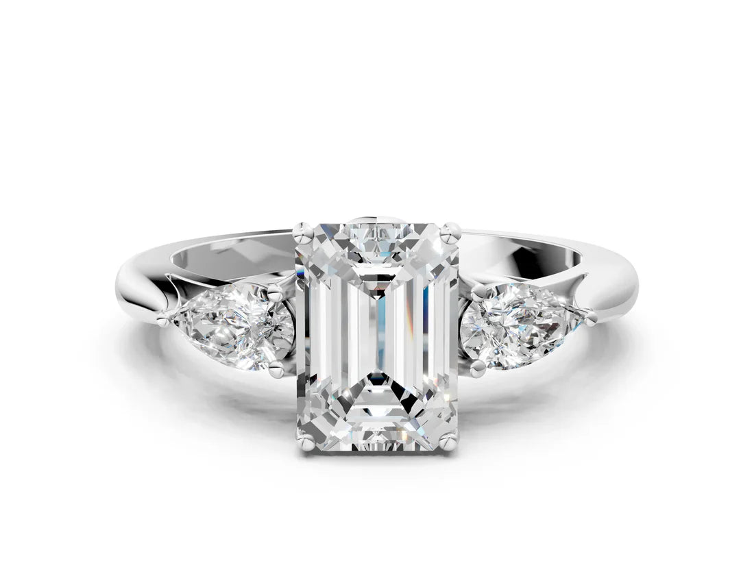 Three-Stone Emerald Cut Lab Diamond Solitaire Ring with Tapered Band and Four-Prong Setting| D VS1