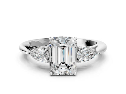 Three-Stone Emerald Cut Lab Diamond Solitaire Ring with Tapered Band and Four-Prong Setting| D VS1