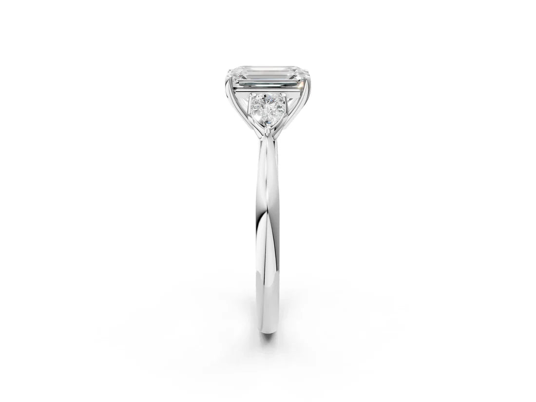 Three-Stone Emerald Cut Lab Diamond Solitaire Ring with Tapered Band and Four-Prong Setting| D VS1