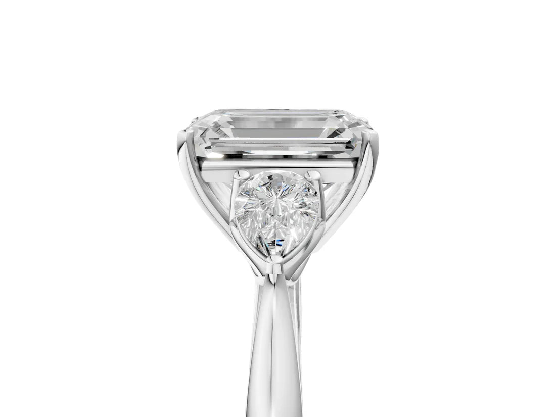 Three-Stone Emerald Cut Lab Diamond Solitaire Ring with Tapered Band and Four-Prong Setting| D VS1