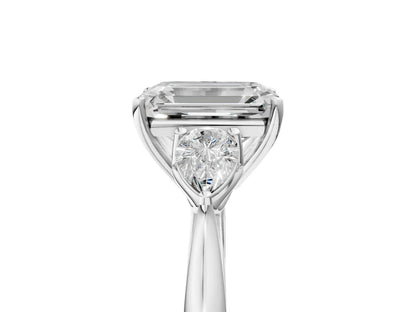 Three-Stone Emerald Cut Lab Diamond Solitaire Ring with Tapered Band and Four-Prong Setting| D VS1