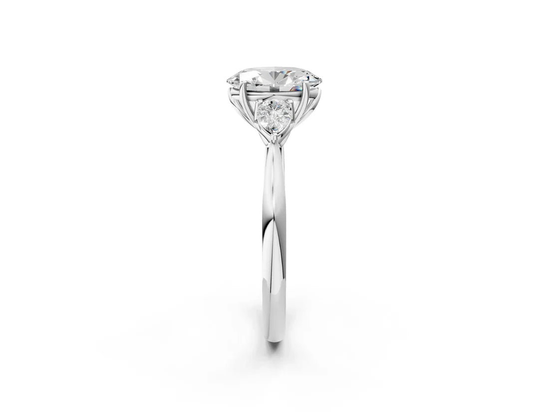 Three-Stone Oval Cut Lab Diamond Solitaire Ring with Tapered Band and Four-Prong Setting| D VS1