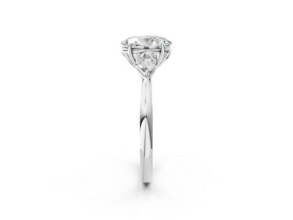 Three-Stone Oval Cut Lab Diamond Solitaire Ring with Tapered Band and Four-Prong Setting| D VS1