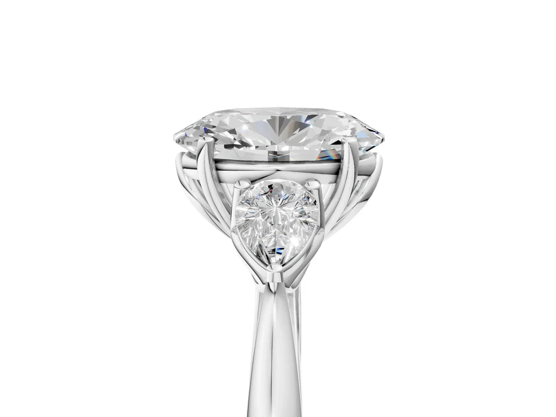 Three-Stone Oval Cut Lab Diamond Solitaire Ring with Tapered Band and Four-Prong Setting| D VS1