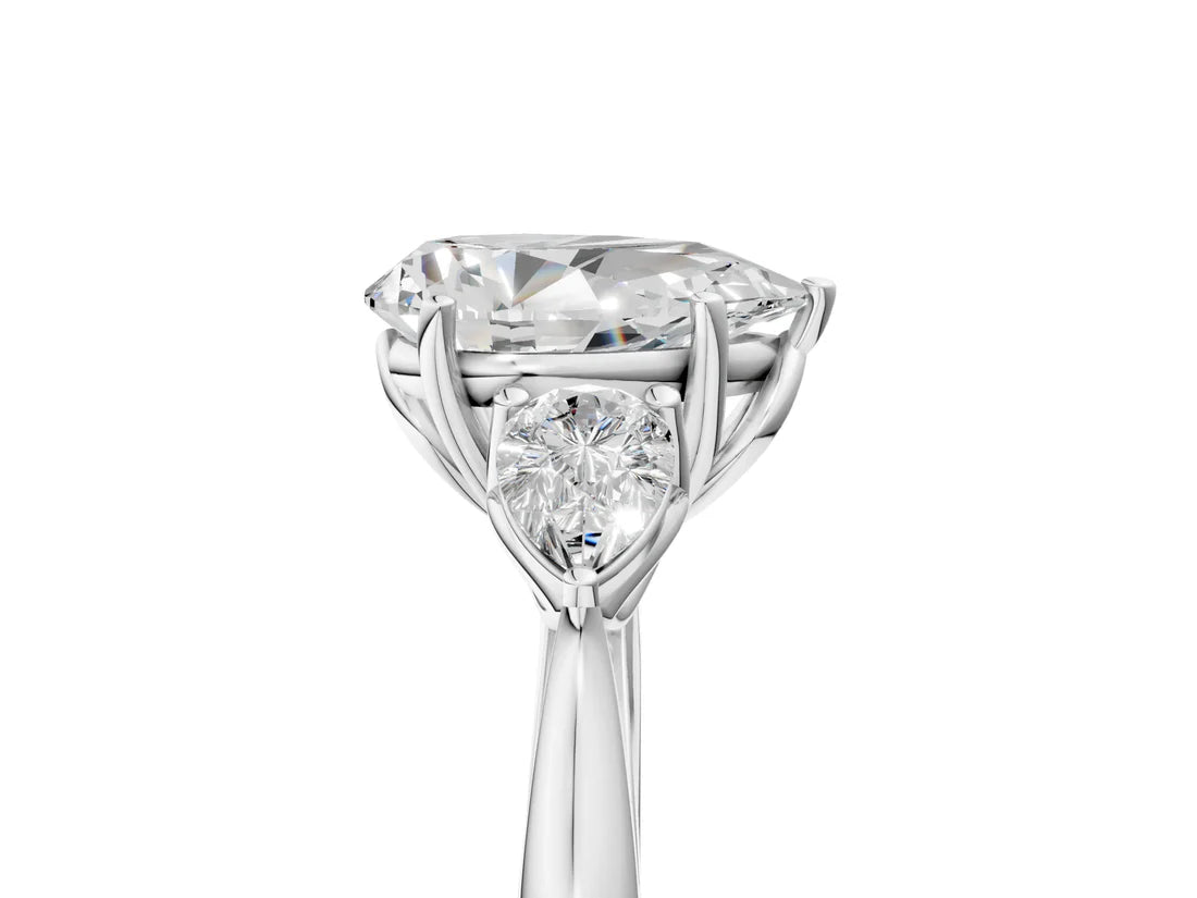 Three-Stone Pear Cut Lab Diamond Solitaire Ring with Tapered Band and Four-Prong Setting| D VS1
