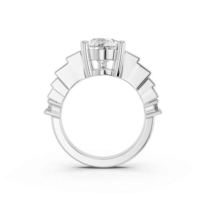 PEAR RING WITH BAGUETTE SIDE STONES