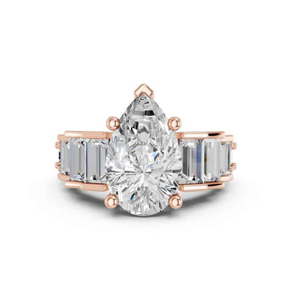 PEAR RING WITH BAGUETTE SIDE STONES