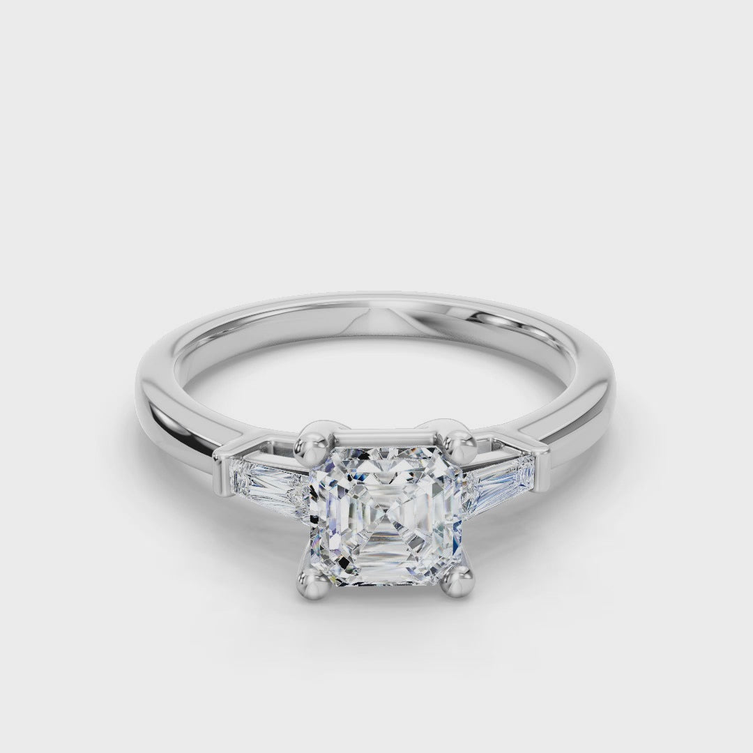 ASSCHER BAGUETTE THREE STONE RING