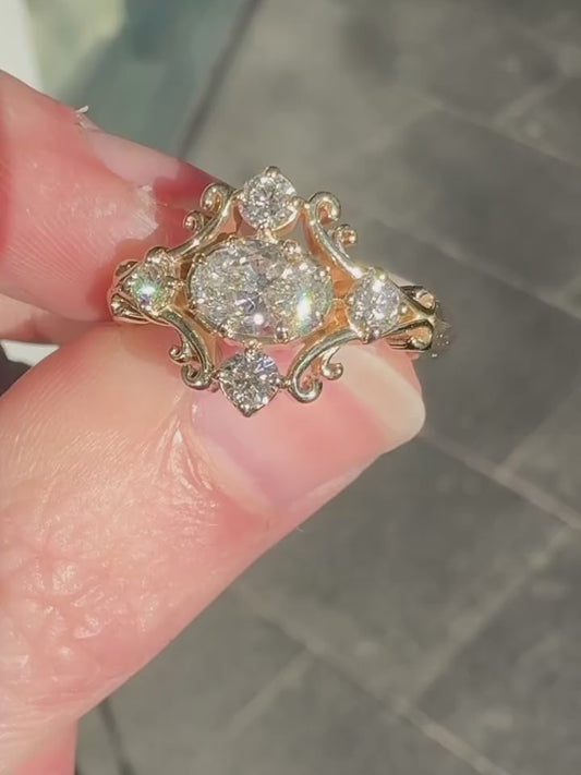 OVAL E-W WITH HALO STONES