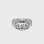 OVAL BEZEL 3 STONE RING