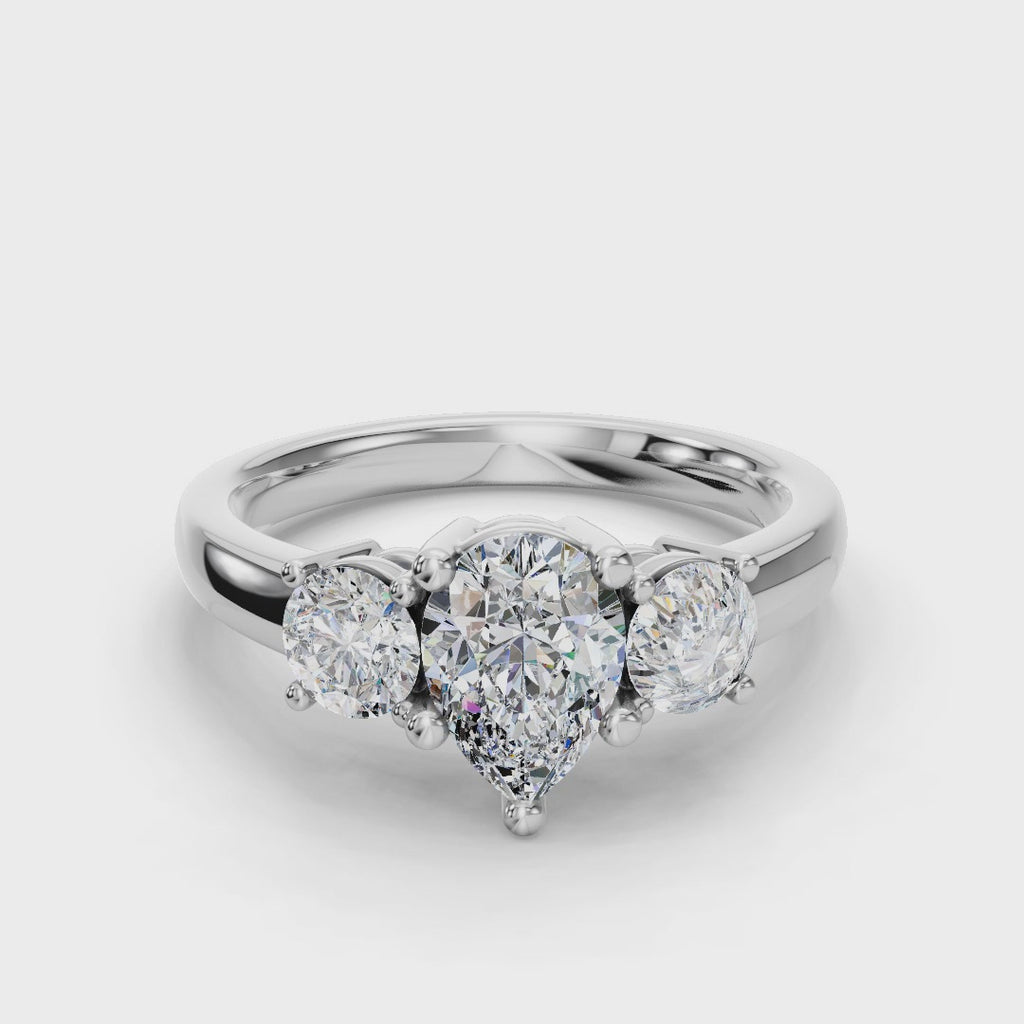 PEAR 3 STONE RING