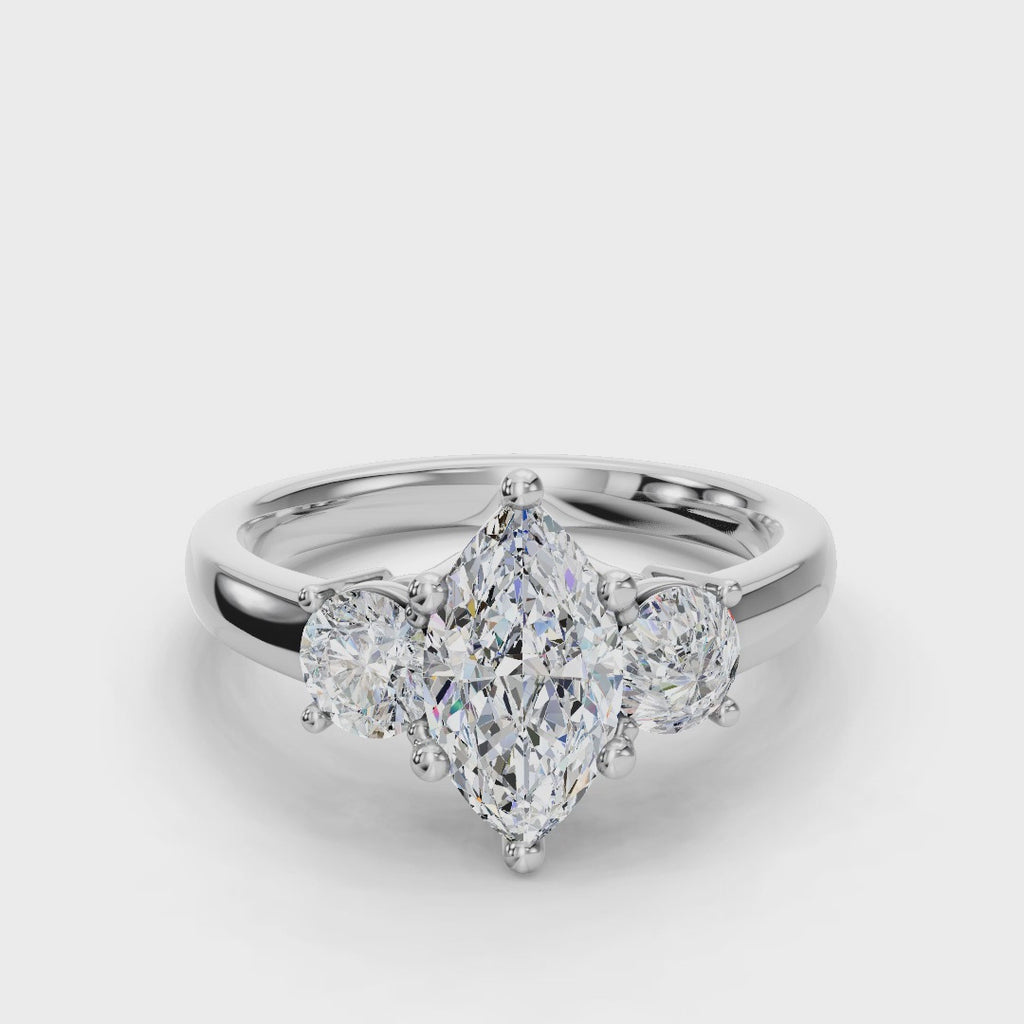 MARQUISE 3 STONE RING