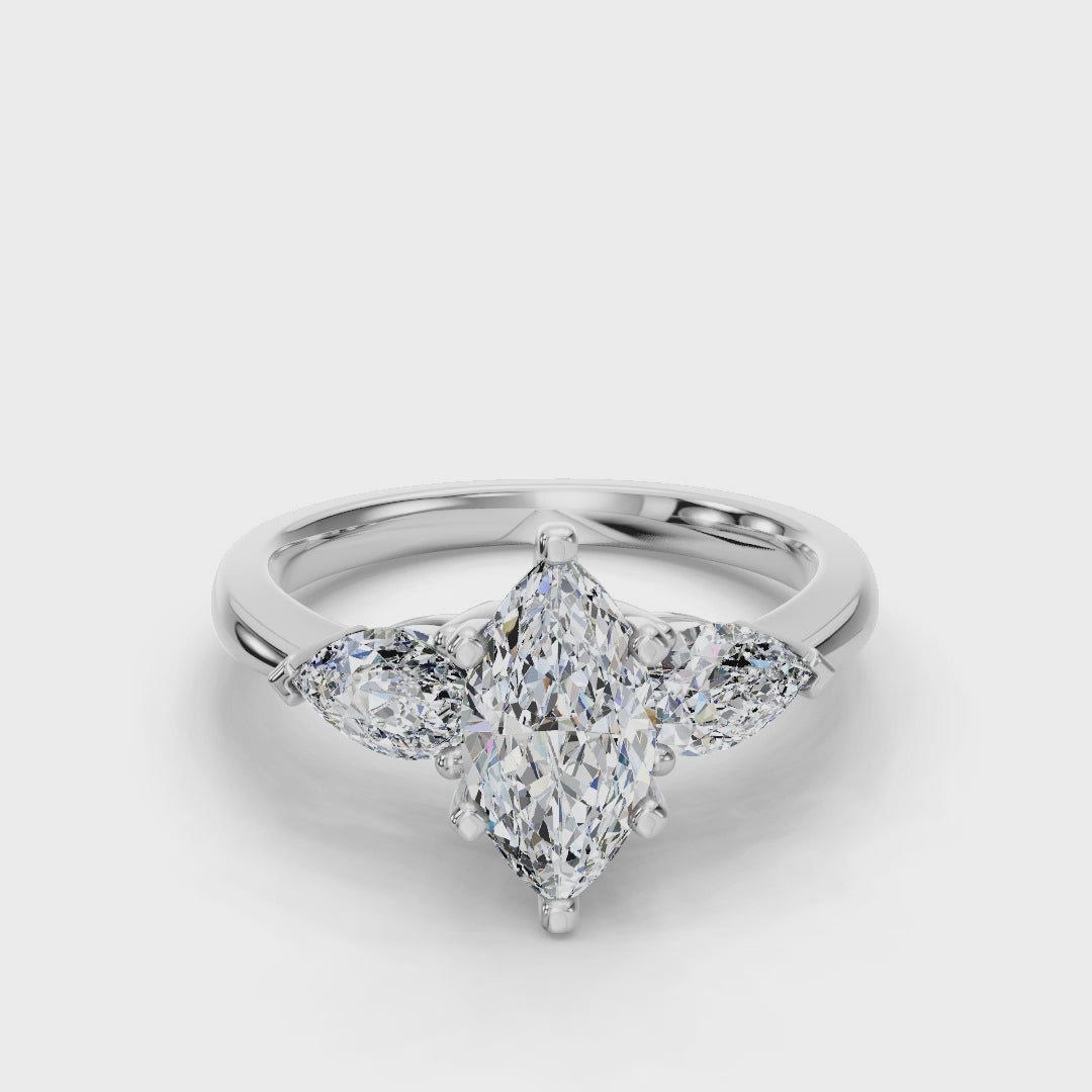 MARQUISE 3 STONE RING