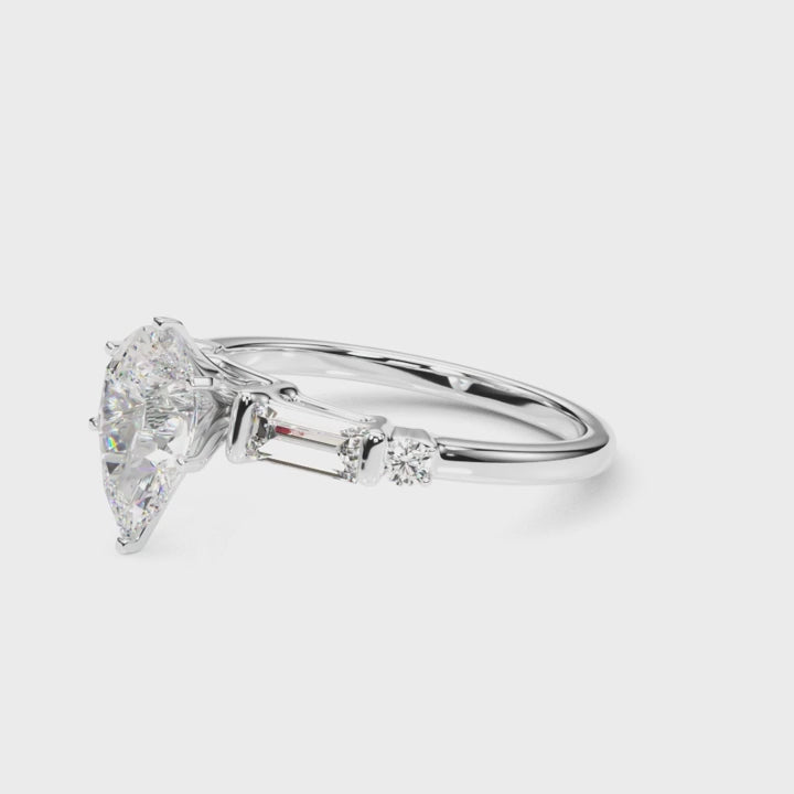 PEAR BAGUETTE ROUND CHANNEL RING