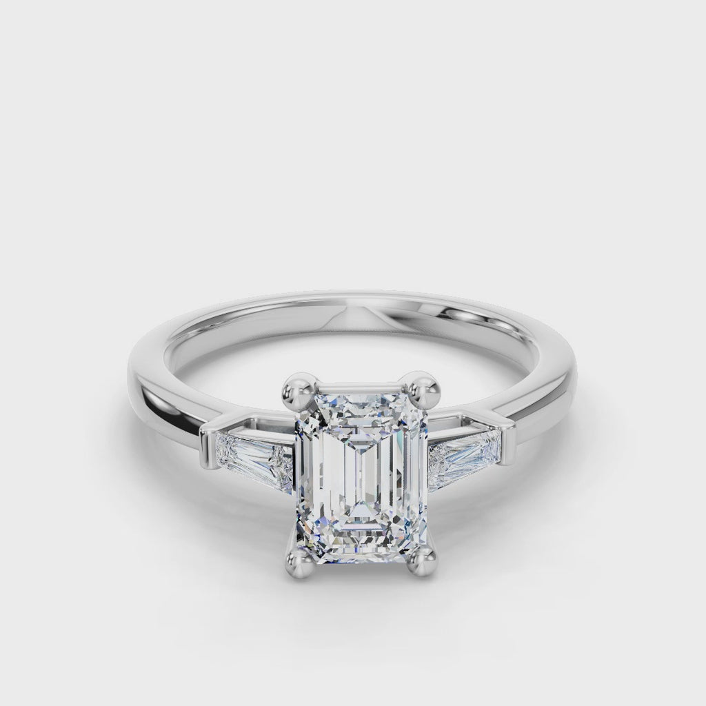 EMERALD BAGUETTE THREE STONE RING