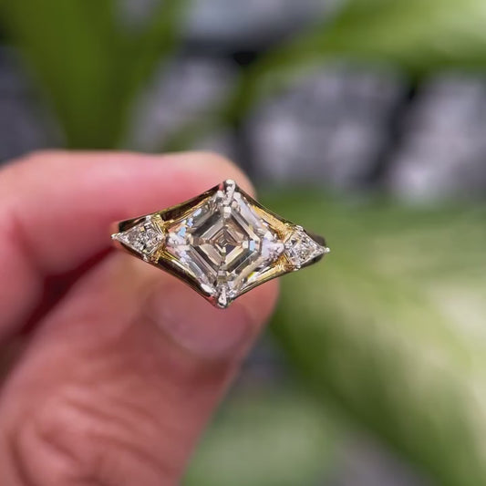 ASSCHER THREE STONE RING WITH KITE SIDE STONES