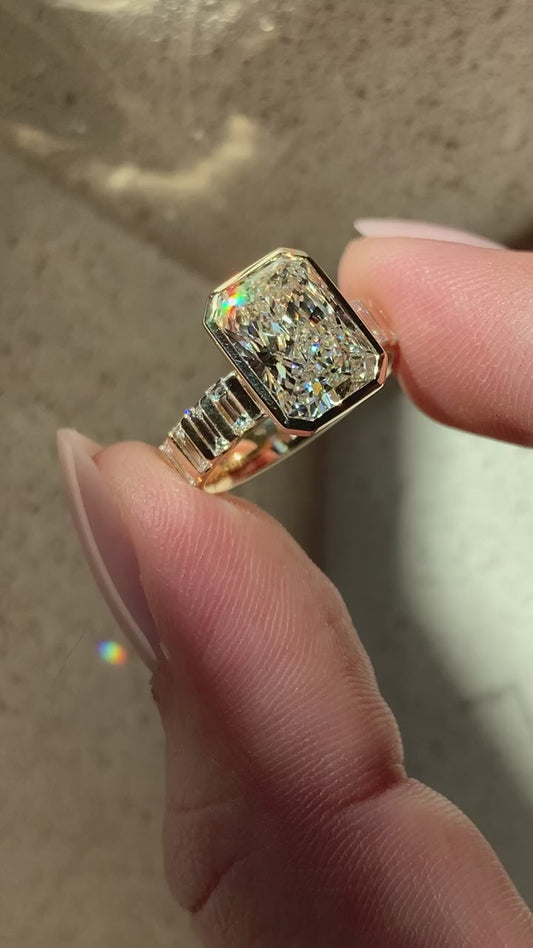 RADIANT BEZEL RING WITH CHANNEL SETTING