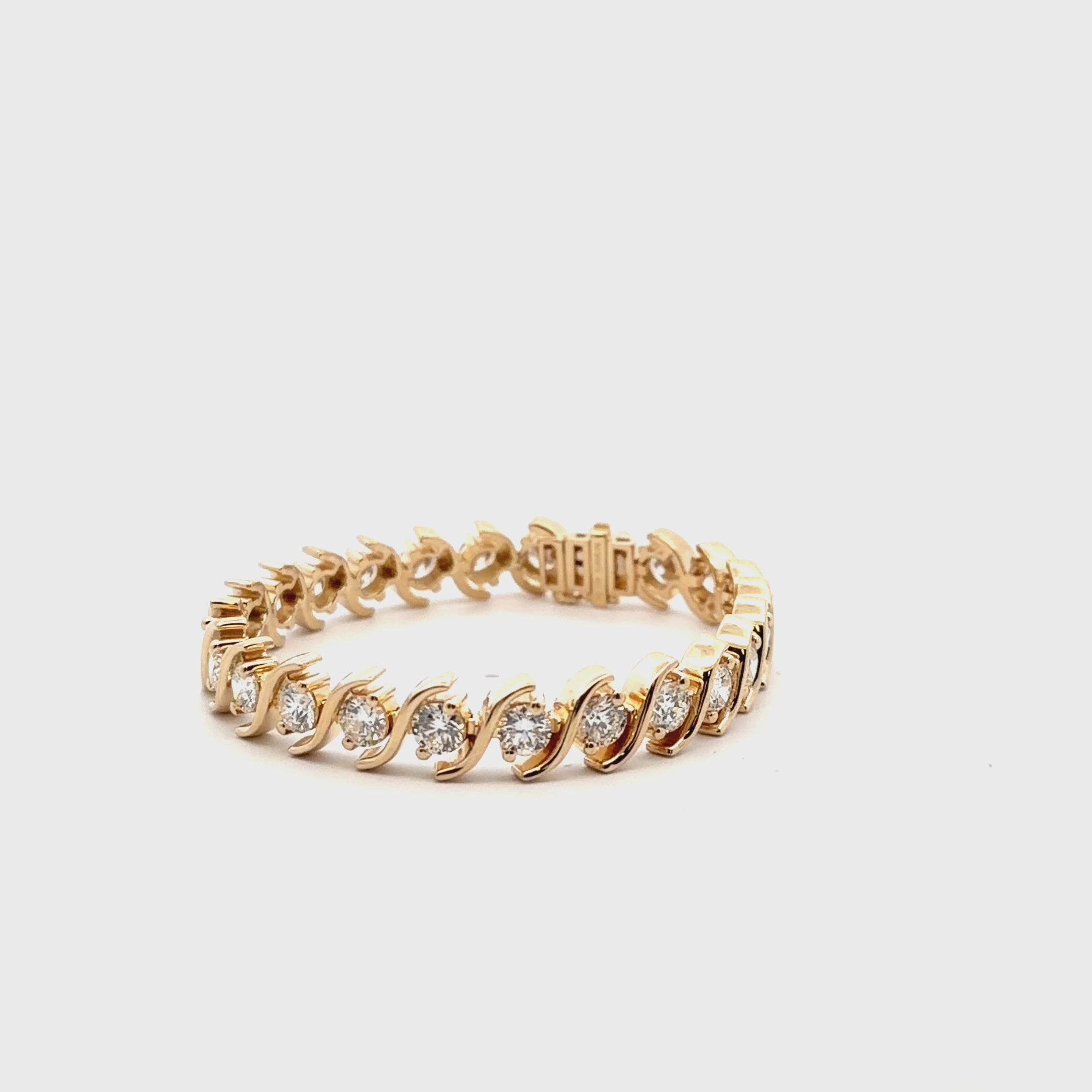FANCY CHANNEL ROUND TENNIS BRACELET