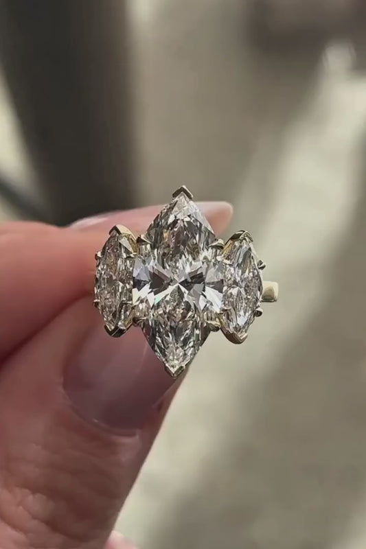 MARQUISE THREE STONE FANCY RING