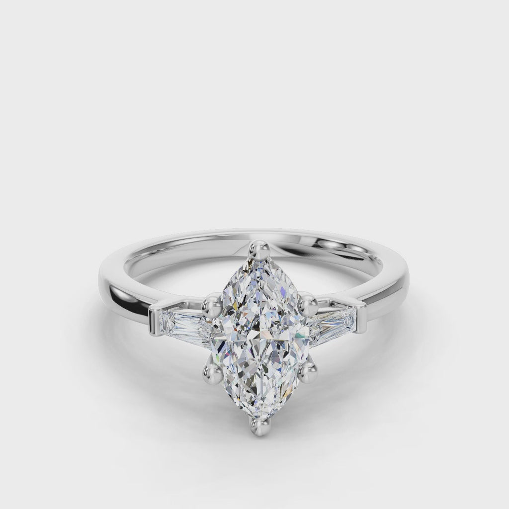 MARQUISE BAGUETTE THREE STONE RING