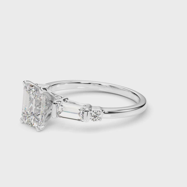 EMERALAD BAGUETTE ROUND CHANNEL RING