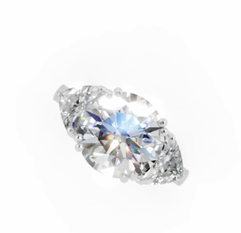 ROUND WITH TRILLION 3 STONE RING