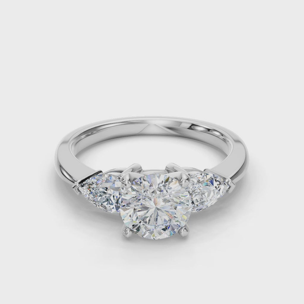 ROUND 3 STONE RING