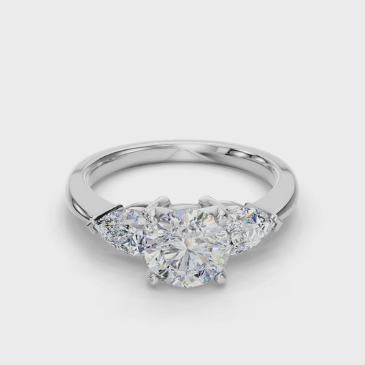ROUND 3 STONE RING