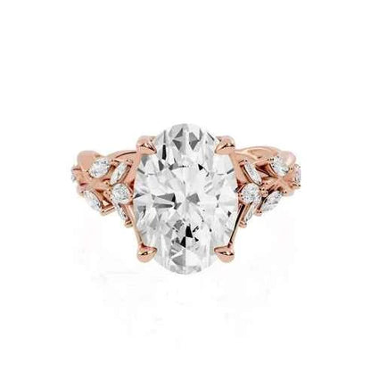 OVAL RING WITH MARQUISE SIDE STONES