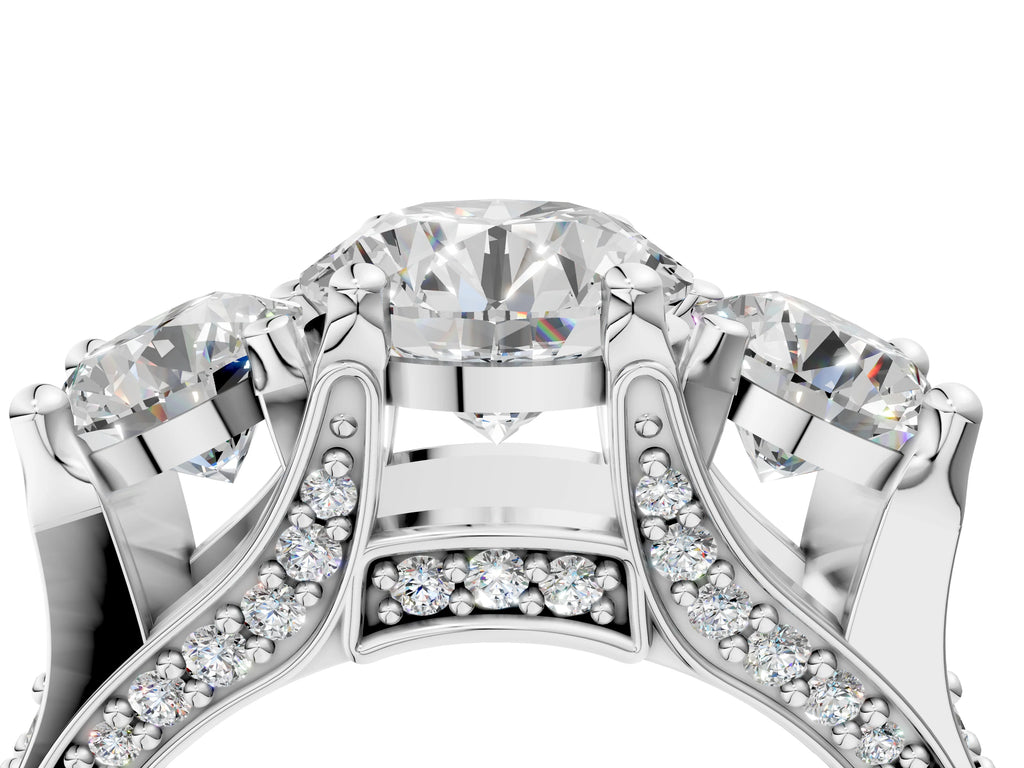 ROUND 3 STONE RING